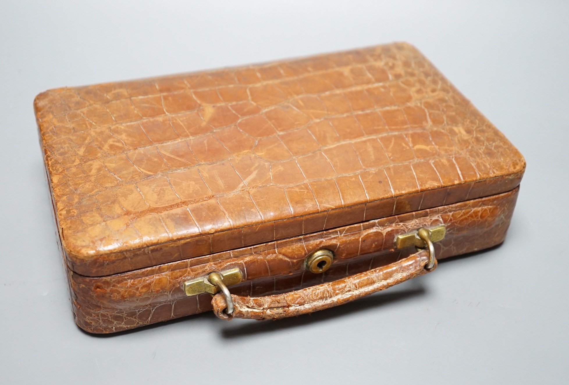 A pre-war Finnegans of Manchester crocodile skin jewellery case